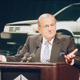 (AP Photo/Richard Drew). Caption via AP: The chairman issued a gloomy forecast for the industry. He said the company was planning for a leaner 1988 and 1989 and defended the decision to close the former A. M. C. plant at Kenosha, Wis., because it was no longer competitive.